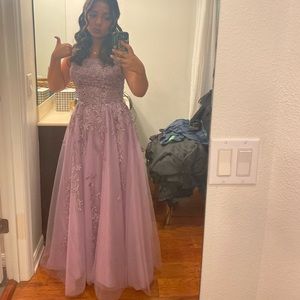 Size 4 lavender tulle prom dress with gems and embroidery.